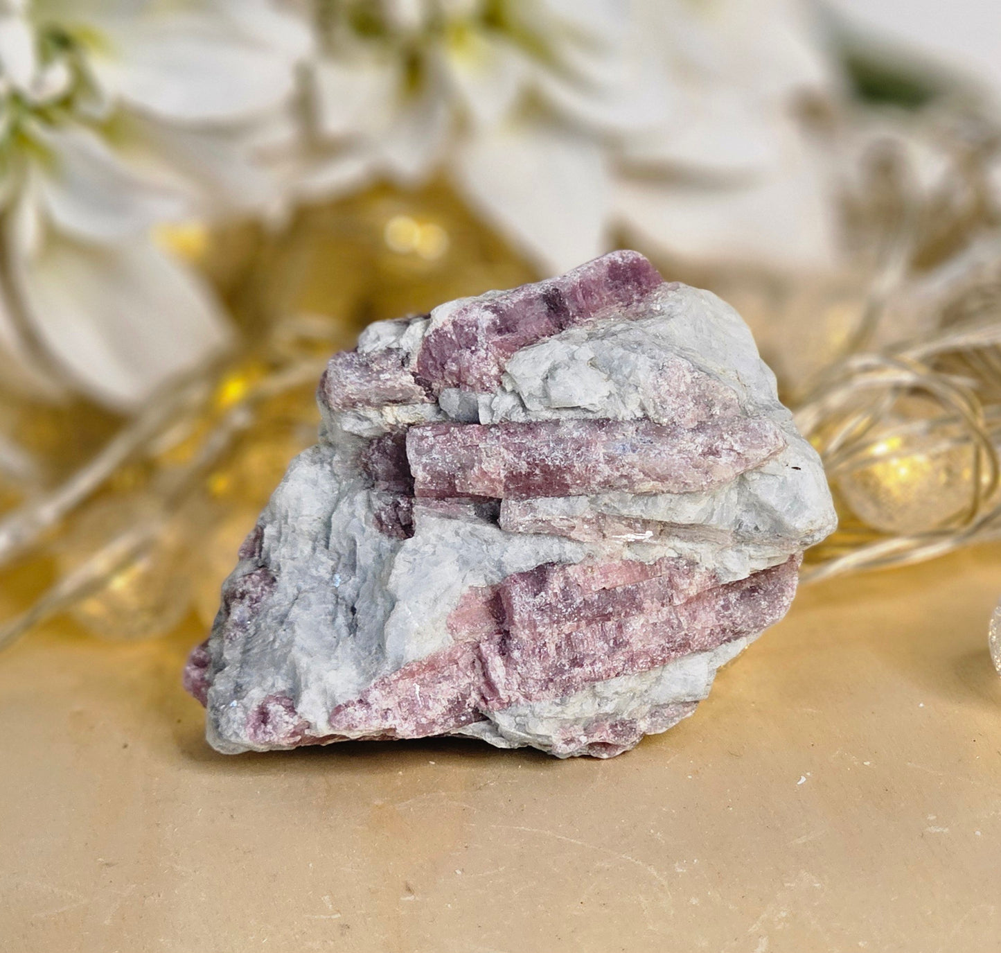 Raw Rubellite in Albite